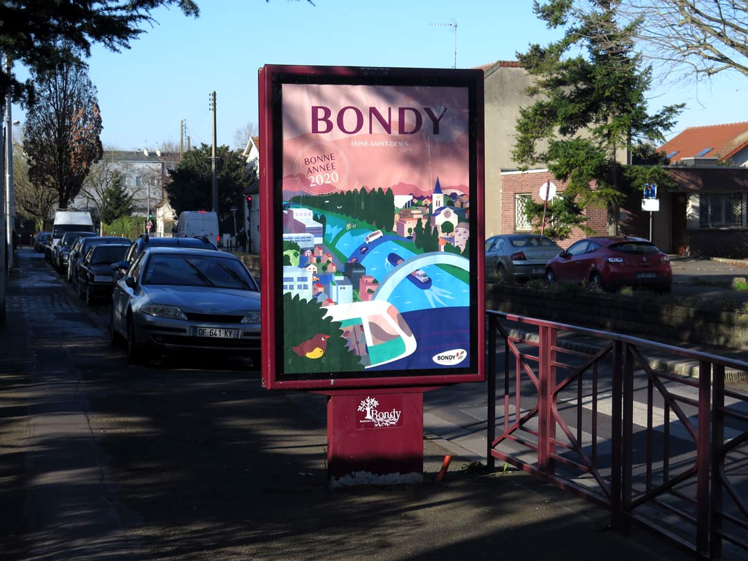 Affiche des voeux 2020 de la Ville de Bondy photographiée sur un panneau d'affichage